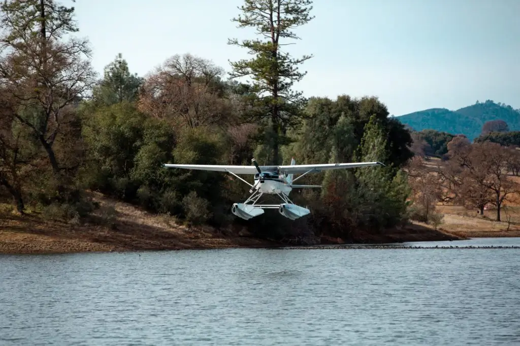 Foothill Aviation seaplane low flight over pond